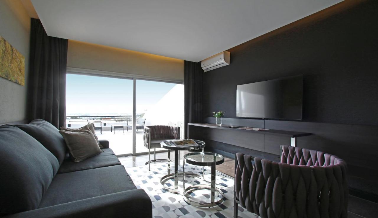 Pinares Panorama Suites, Spa & Convention Center Villa Carlos Paz Bagian luar foto