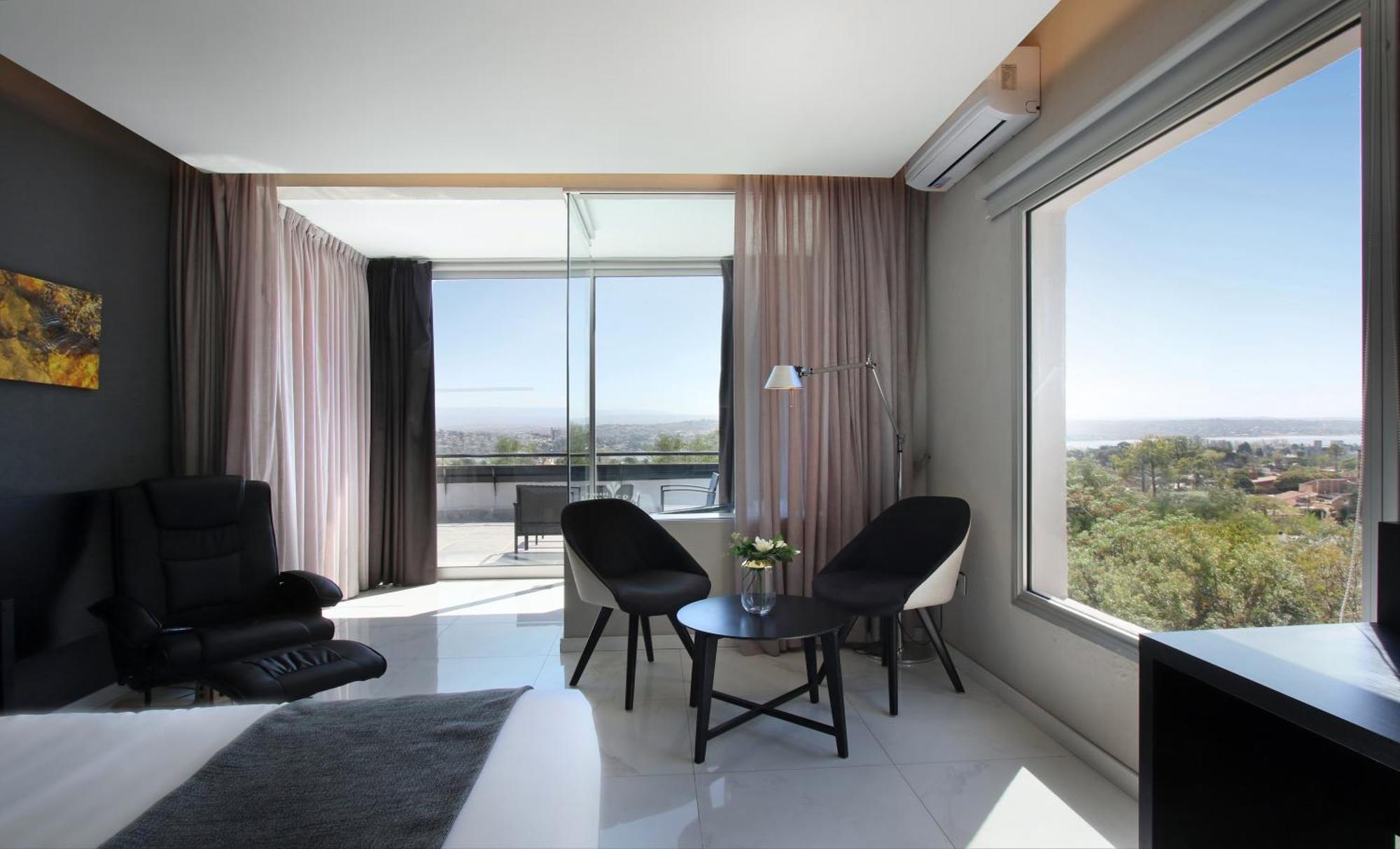 Pinares Panorama Suites, Spa & Convention Center Villa Carlos Paz Bagian luar foto